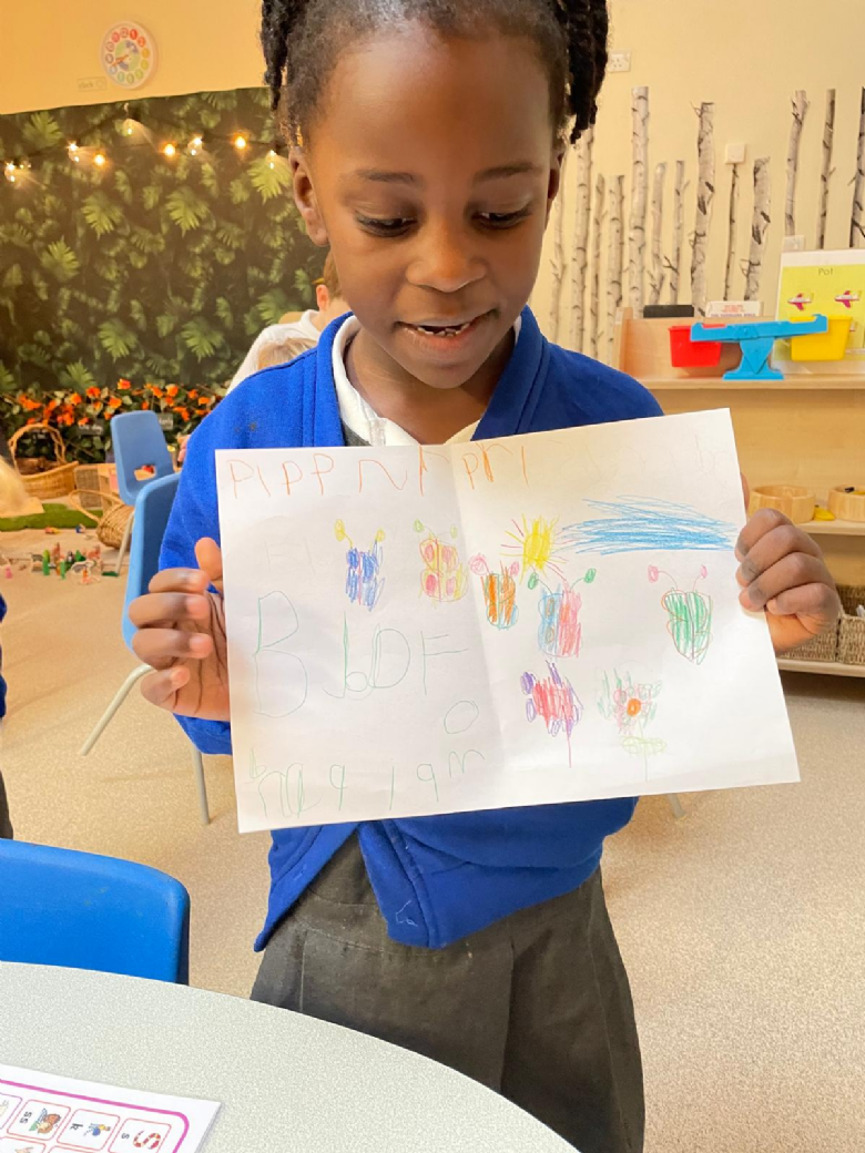 Child writing and drawing